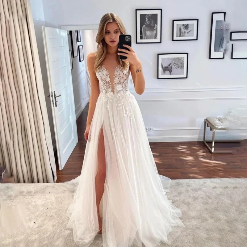 Bohemian Wedding Dresses Women's Sexy Deep V-Neck Tulle Applique A-Line Sleeveless Off Shoulder Princess Bridal Gowns High Robe
Bohemian Wedding Dresses Women's Sexy Deep V-Neck Tulle Applique A-Line Sleeveless Off Shoulder Princess Bridal Gowns High Robe