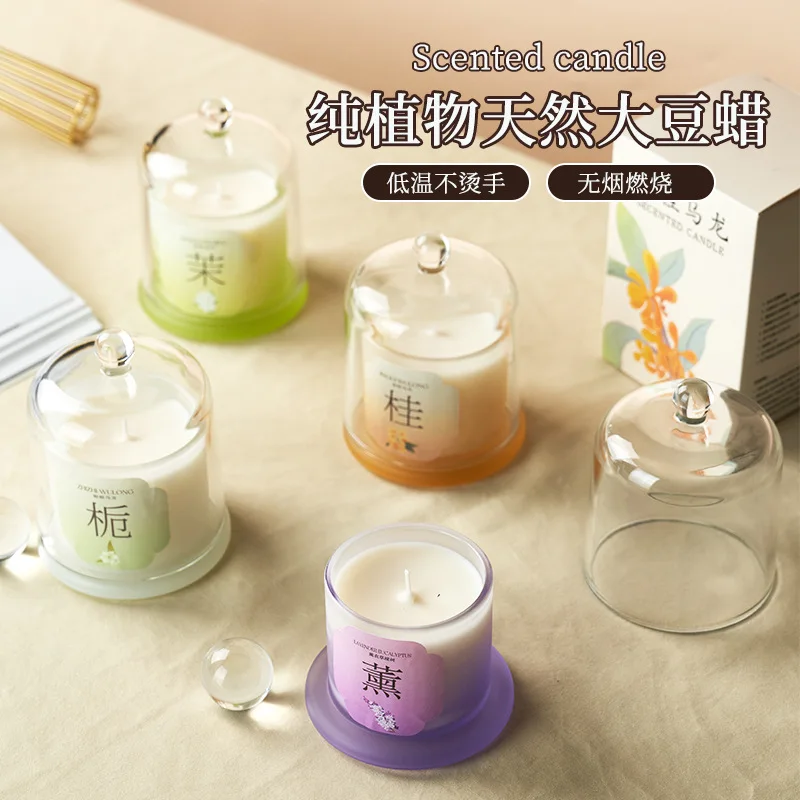 Scented candle in glass jar in golden bell jar, smokeless fragrance of soy wax. Home fragrance with gift decorations.
Scented candle in glass jar in golden bell jar, smokeless fragrance of soy wax. Home fragrance with gift decorations.