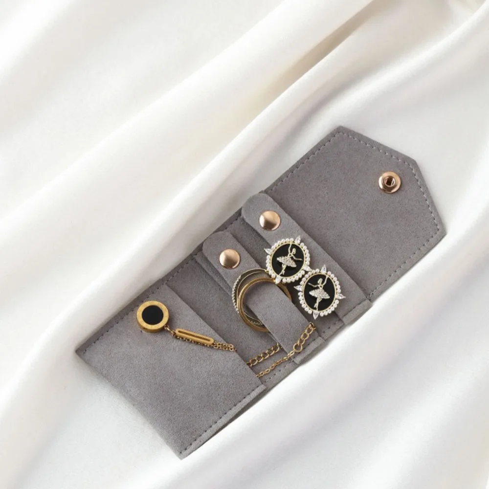 New Mini Jewelry Storage Bags Snap Button Gifts Earring Ring Organizer Microfiber Leather Packaging Pouch
New Mini Jewelry Storage Bags Snap Button Gifts Earring Ring Organizer Microfiber Leather Packaging Pouch