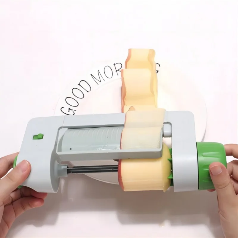 Manual rotary fruit and vegetable slicer for potatoesFeggie Sheet SlicerKitchen utensil potato roll
Manual rotary fruit and vegetable slicer for potatoesFeggie Sheet SlicerKitchen utensil potato roll