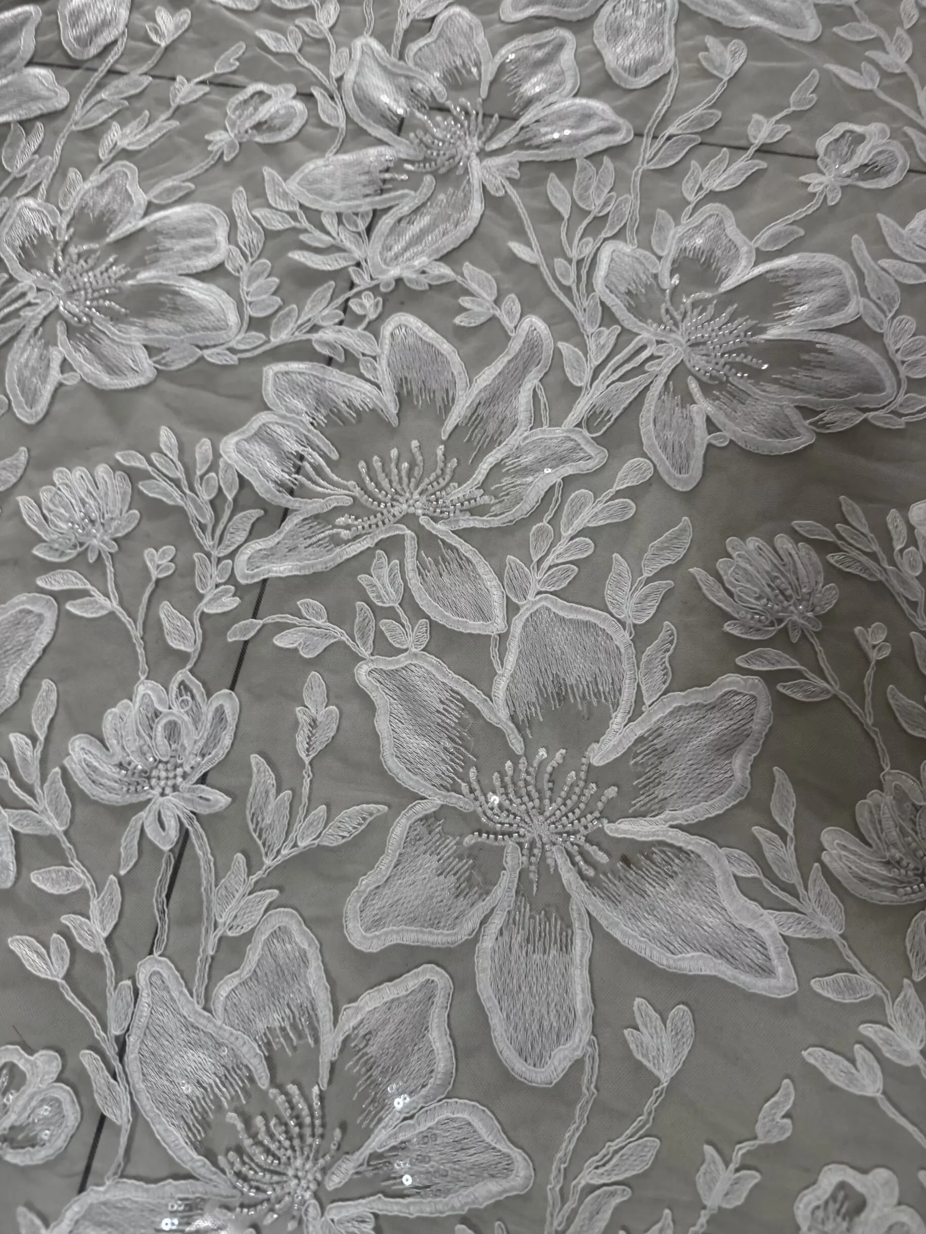 Embroidered Beaded Sequin Appliqued Floral Branch Lace Fabric Pattern for Bridal Gowns High-End Apparel Material
Embroidered Beaded Sequin Appliqued Floral Branch Lace Fabric Pattern for Bridal Gowns High-End Apparel Material