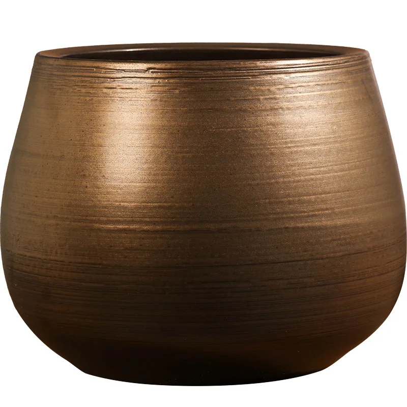 Ceramic flower pot floor-to-ceiling large-diameter living room B & B hotel advanced sense hydroponic pottery pot vase ornament
Ceramic flower pot floor-to-ceiling large-diameter living room B & B hotel advanced sense hydroponic pottery pot vase ornament