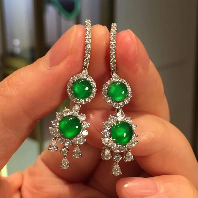 Imitation chalcedony ice glass seed bright green egg surface earrings inlaid with high-end temperament models for family
Imitation chalcedony ice glass seed bright green egg surface earrings inlaid with high-end temperament models for family