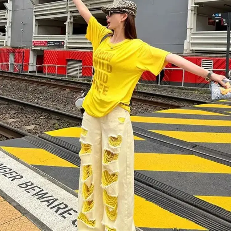American Large-Area Ripped Jeans Women Summer New Design High Street Niche Loose Casual Versatile Straight Long Wide-Leg Pants
American Large-Area Ripped Jeans Women Summer New Design High Street Niche Loose Casual Versatile Straight Long Wide-Leg Pants