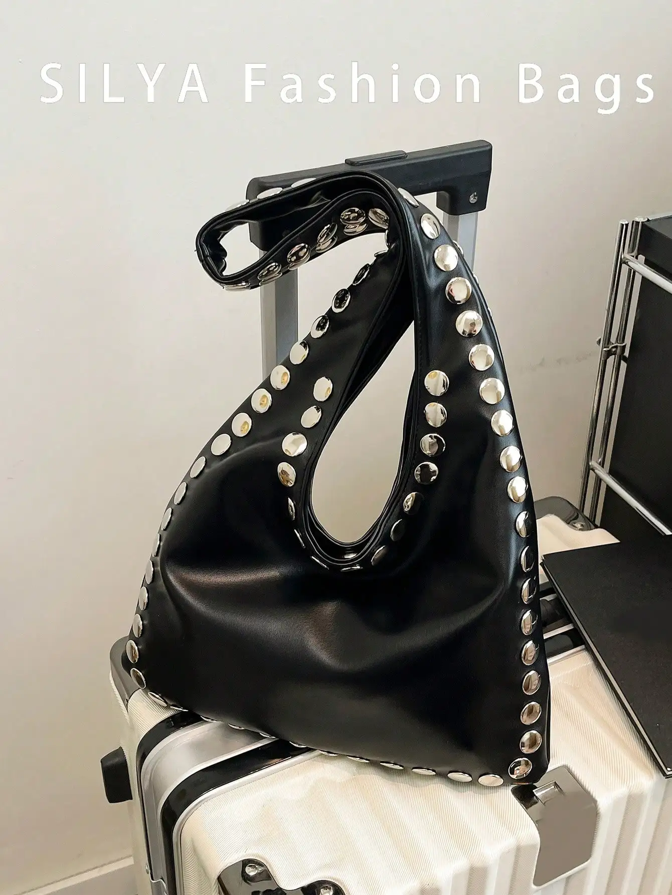 Black PU Leather Studded Slouchy Shoulder Bag with Rivet Trim, Large Capacity for Travel & Events
Black PU Leather Studded Slouchy Shoulder Bag with Rivet Trim, Large Capacity for Travel & Events