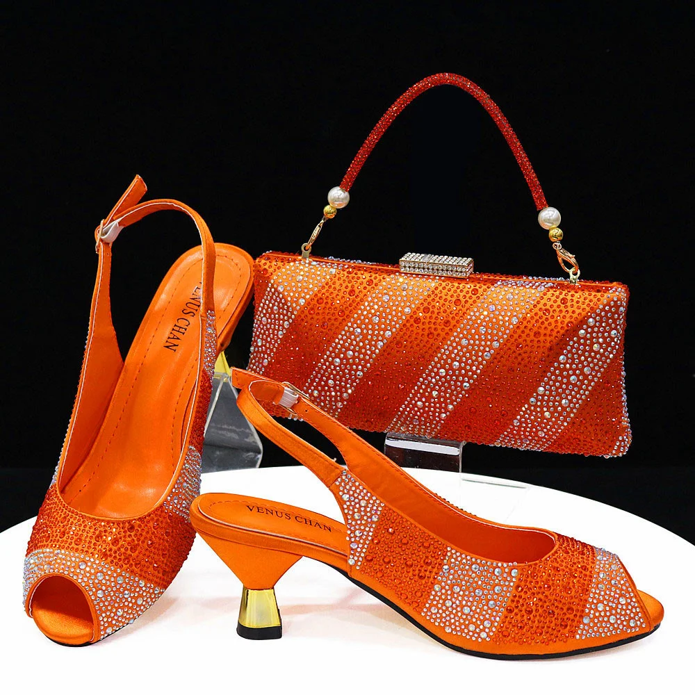 2025 Italian Newest Rhinestone Orange Colors Striped Style Design Exquisite Fashion Pointed High Heels And Exquisite Clutch Bag
2025 Italian Newest Rhinestone Orange Colors Striped Style Design Exquisite Fashion Pointed High Heels And Exquisite Clutch Bag