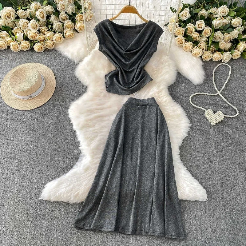 Sexy swing collar slim fit irregular design top high waist long skirt women's summer new solid color elegant two-piece set
Sexy swing collar slim fit irregular design top high waist long skirt women's summer new solid color elegant two-piece set