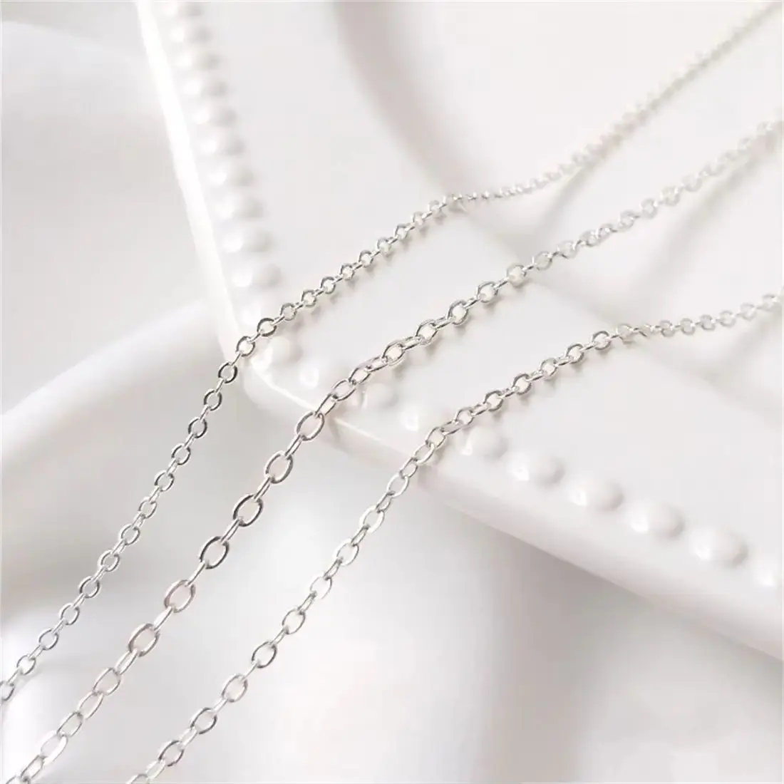 Korean Copper Chain Plated with S925 Pure Silver O-shaped Cross Chain Loose Chain Handcrafted DIY Necklace Jewelry Accessories
Korean Copper Chain Plated with S925 Pure Silver O-shaped Cross Chain Loose Chain Handcrafted DIY Necklace Jewelry Accessories