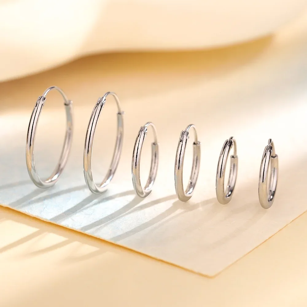 Real 925 Sterling Silver 13/15/20MM Classic Round Hoop Earrings for Women Minimalist Fine Jewelry Geometric Accessories
Real 925 Sterling Silver 13/15/20MM Classic Round Hoop Earrings for Women Minimalist Fine Jewelry Geometric Accessories