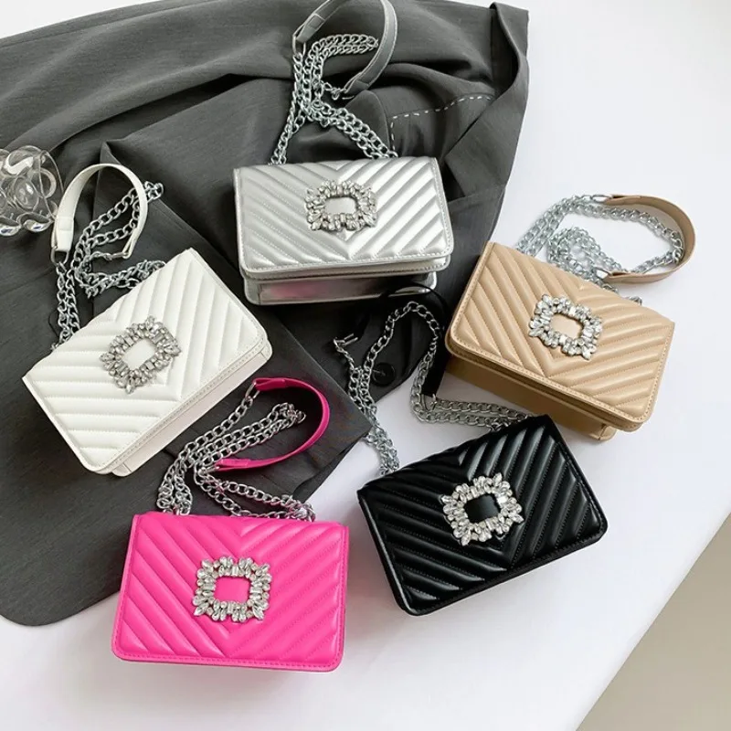 Premium Textured Bag Women's Summer New Rhinestone Lock Indentation Chain Versatile Shoulder Bag Small Square Bag
Premium Textured Bag Women's Summer New Rhinestone Lock Indentation Chain Versatile Shoulder Bag Small Square Bag