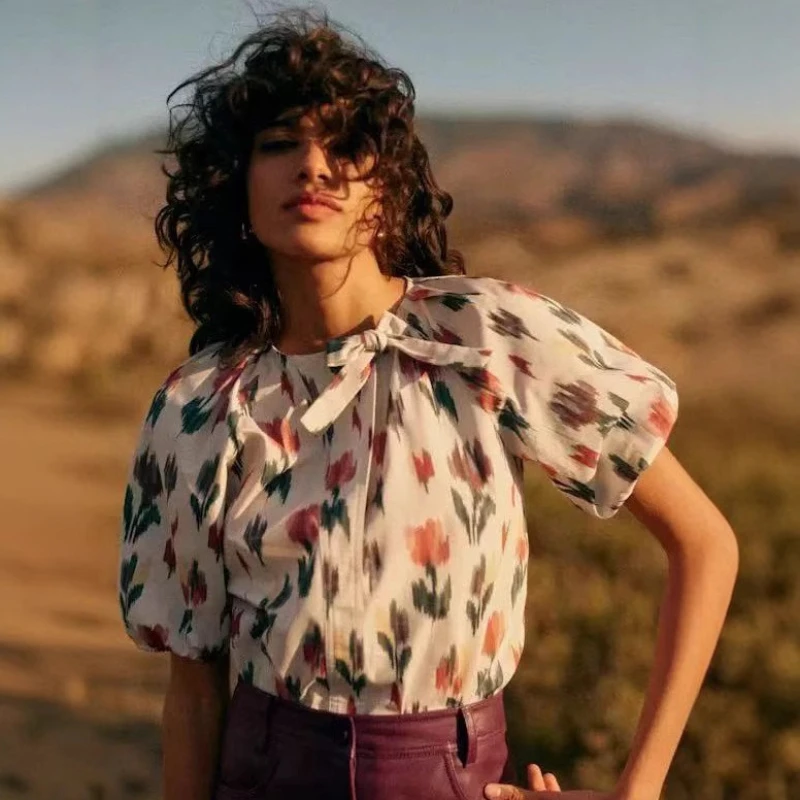 2025 Sezanes T-shirt Vintage Tulip Print Round Neck Tie Bubble Sleeve Top High Waisted Halter Skirt Two Piece Set
2025 Sezanes T-shirt Vintage Tulip Print Round Neck Tie Bubble Sleeve Top High Waisted Halter Skirt Two Piece Set