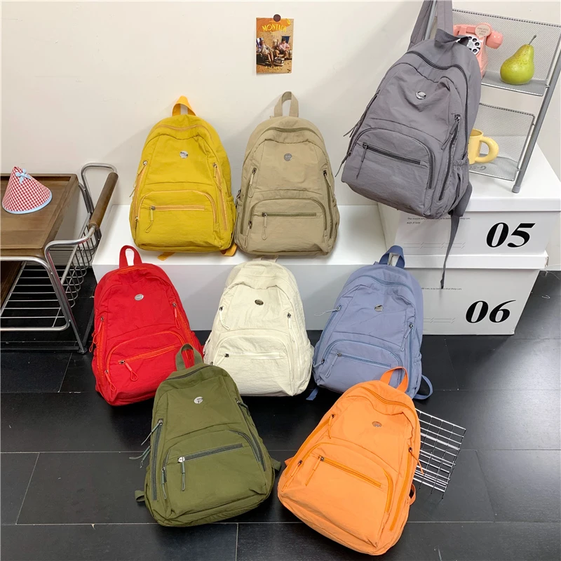 Solid color casual backpack,Multi-pocket lightweight travel and commuting backpack,Simple and large-capacity student backpack
Solid color casual backpack,Multi-pocket lightweight travel and commuting backpack,Simple and large-capacity student backpack