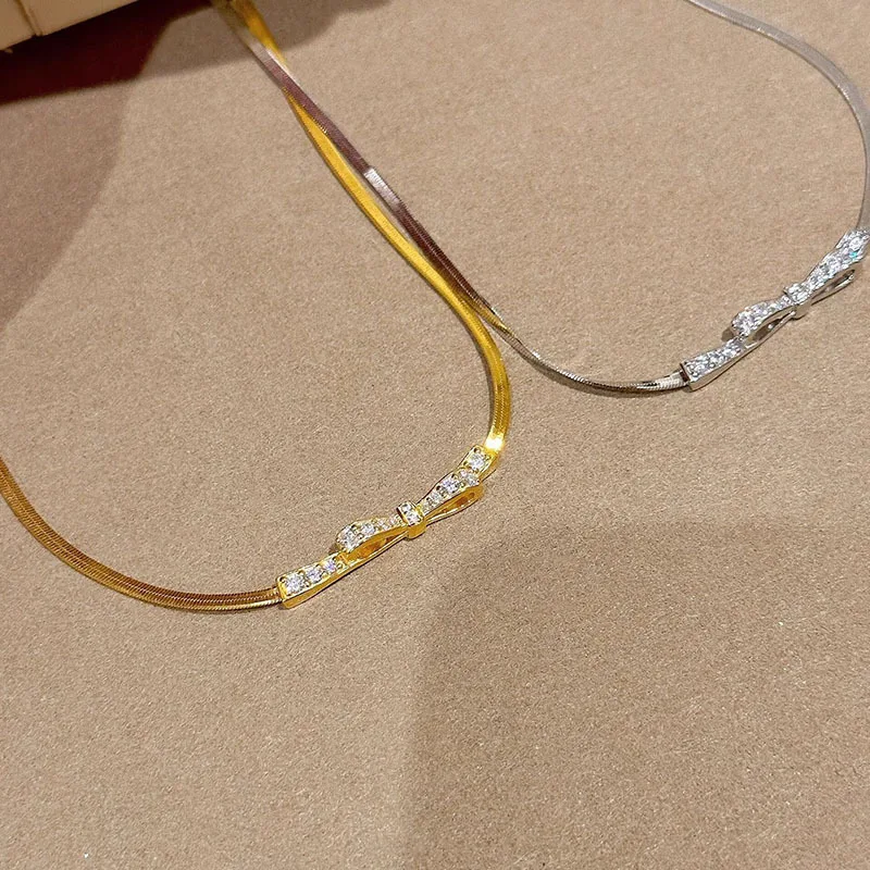 Simple and high-quality bowknot diamond snake bone chain necklace new in light luxury exquisite small design party jewelry gift
Simple and high-quality bowknot diamond snake bone chain necklace new in light luxury exquisite small design party jewelry gift