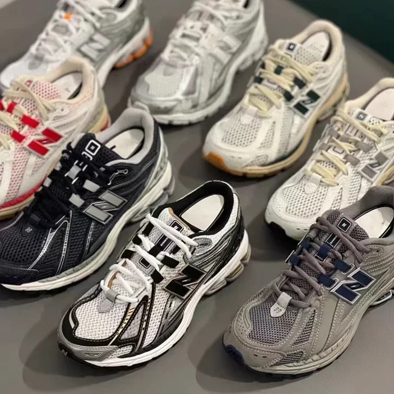 Classic sports running shoes, retro mesh breathable women's shoes, silver-white-yellow three-color heightening men's shoes.
Classic sports running shoes, retro mesh breathable women's shoes, silver-white-yellow three-color heightening men's shoes.