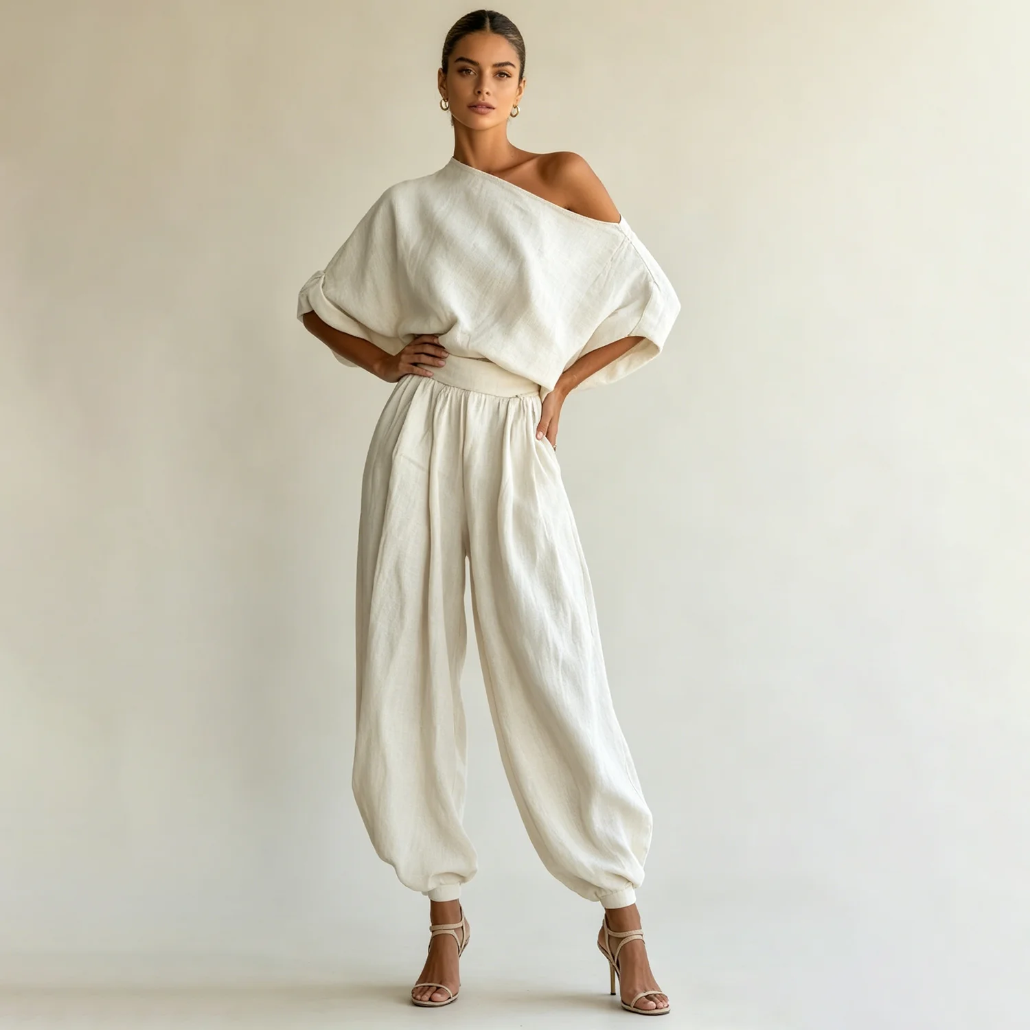 LIMO Off-Shoulder Linen Two-Piece Set with Belted Top and Harem Pants
LIMO Off-Shoulder Linen Two-Piece Set with Belted Top and Harem Pants