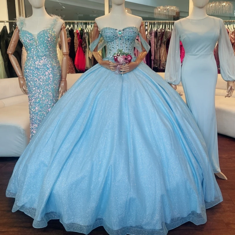 Небесно-голубое блестящее бальное платье Quinceanera Платья с открытыми плечами и бисером из тюля с кристаллами для вечеринки, дня рождения, сладкое платье 16, Vestidos 15 De
Небесно-голубое блестящее бальное платье Quinceanera Платья с открытыми плечами и бисером из тюля с кристаллами для вечеринки, дня рождения, сладкое платье 16, Vestidos 15 De