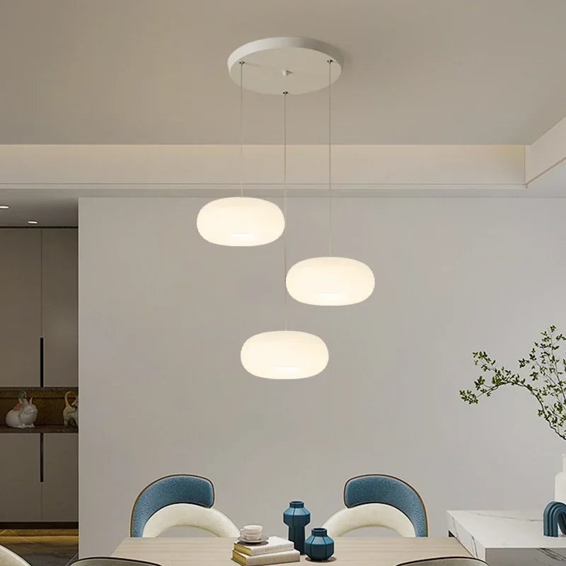 Restaurant chandelier modern simple cream wind persimmon chandelier Bauhaus three-headed dining table bar lamps
Restaurant chandelier modern simple cream wind persimmon chandelier Bauhaus three-headed dining table bar lamps