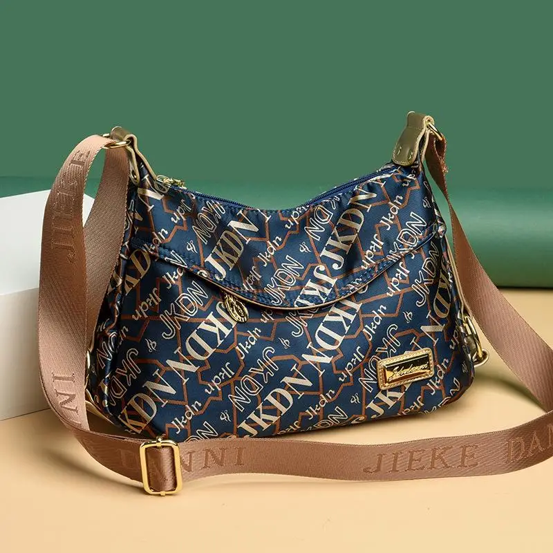 AS826 2025 New Waterproof Oxford Cloth Middle-aged Women's Mother Bag Versatile Large Capacity Multi-compartment
AS826 2025 New Waterproof Oxford Cloth Middle-aged Women's Mother Bag Versatile Large Capacity Multi-compartment