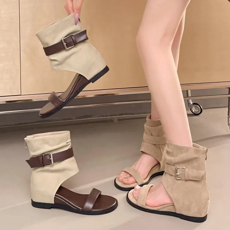 French Niche High Wedge Cool Boots for Women 2026 New One-line Strap Versatile Roman Sandals
French Niche High Wedge Cool Boots for Women 2026 New One-line Strap Versatile Roman Sandals