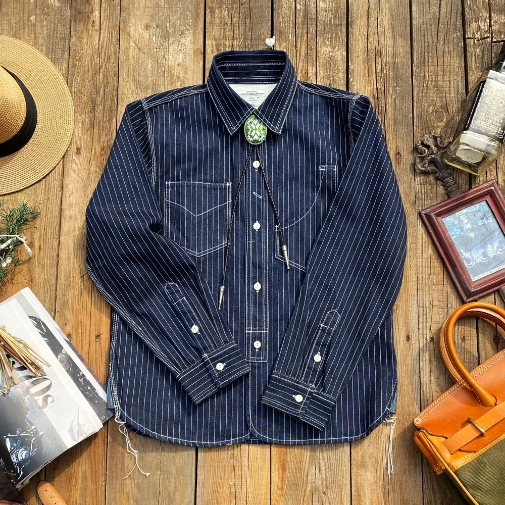 Tailor Brando T-7American Vintage Heavyweight 12,5 унций хлопковая джинсовая рубашка в вертикальную полоску Indigo Hundred Work Мужская рубашка в стиле вестерн 
Tailor Brando T-7American Vintage Heavyweight 12,5 унций хлопковая джинсовая рубашка в вертикальную полоску Indigo Hundred Work Мужская рубашка в стиле вестерн