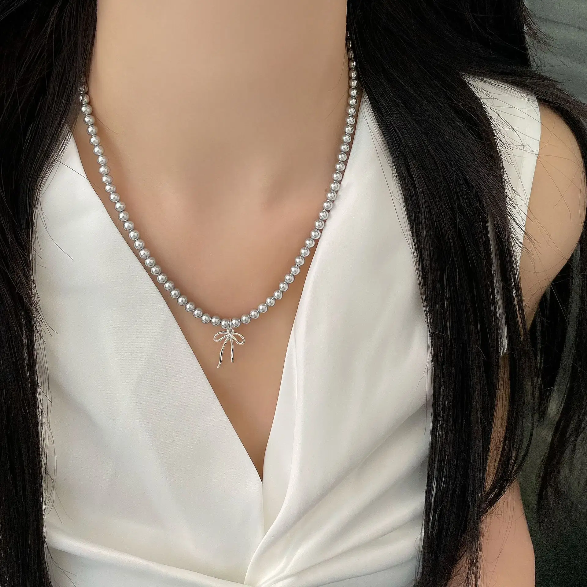 Серебряное колье S925 с жемчугом и бантом, женское, в корейском стиле, модное, легкое, роскошное, элегантное, сексуальное украшение.
Серебряное колье S925 с жемчугом и бантом, женское, в корейском стиле, модное, легкое, роскошное, элегантное, сексуальное украшение.