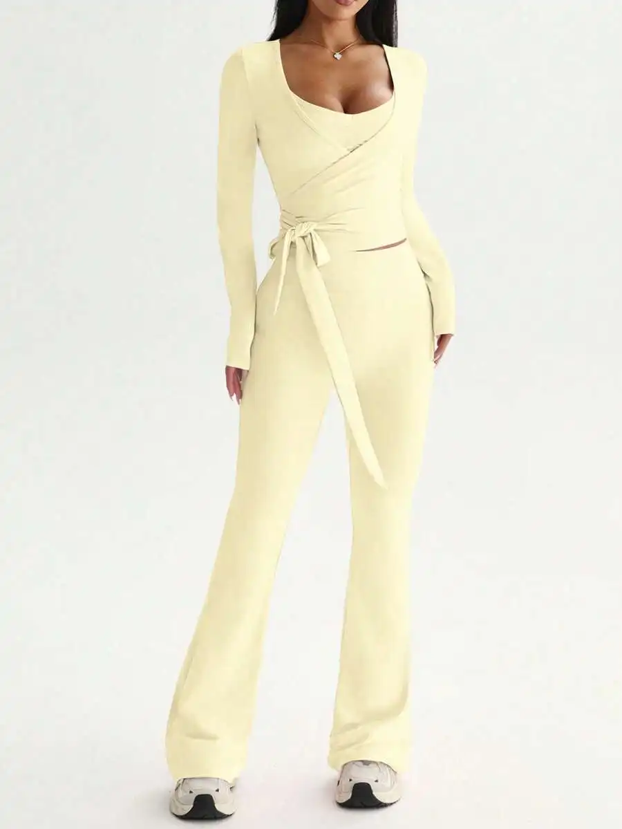 Womens 3-Piece Sports Set: Long Sleeve Top, Adjustable Wrap Top, High Waist Flared Pants
Womens 3-Piece Sports Set: Long Sleeve Top, Adjustable Wrap Top, High Waist Flared Pants