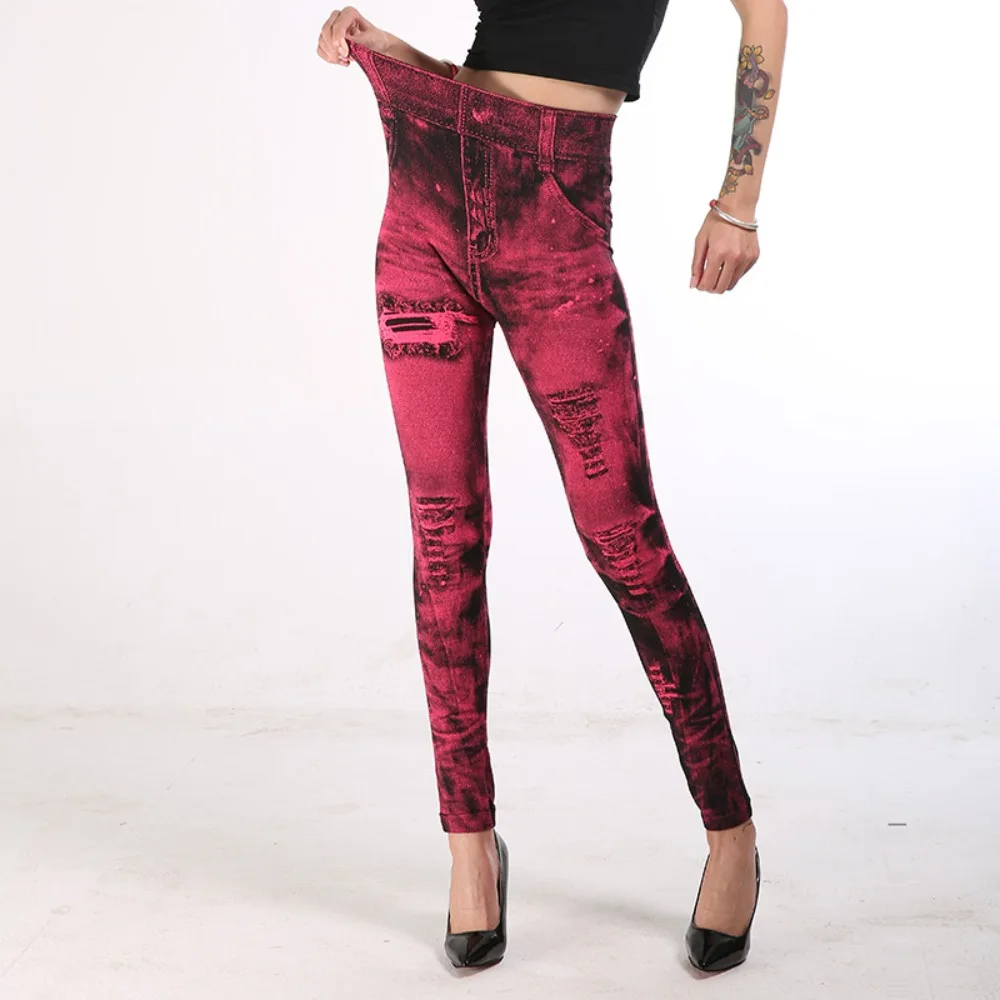 2025 Women Long Pants Multi Pockets Skinny Imitation Jeans Leggings Hip Lifting Ripped Holes Print Mid Waist Elastic Pants
2025 Women Long Pants Multi Pockets Skinny Imitation Jeans Leggings Hip Lifting Ripped Holes Print Mid Waist Elastic Pants