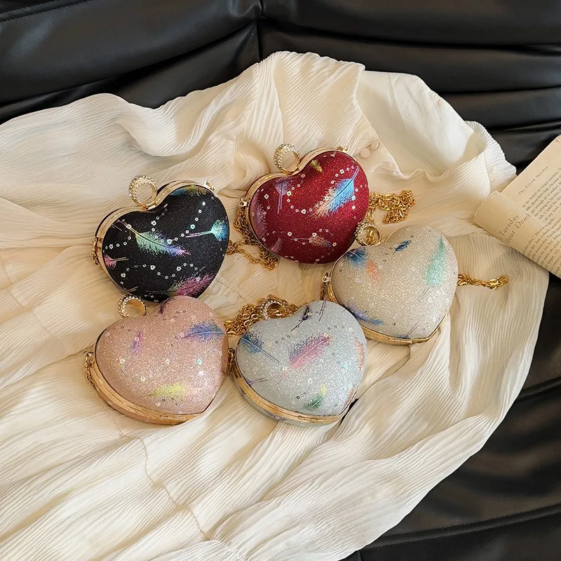 New Banquet Bag Women's Trend Fashion Glossy Heart Chain Bag Versatile Shoulder Messenger Bag
New Banquet Bag Women's Trend Fashion Glossy Heart Chain Bag Versatile Shoulder Messenger Bag