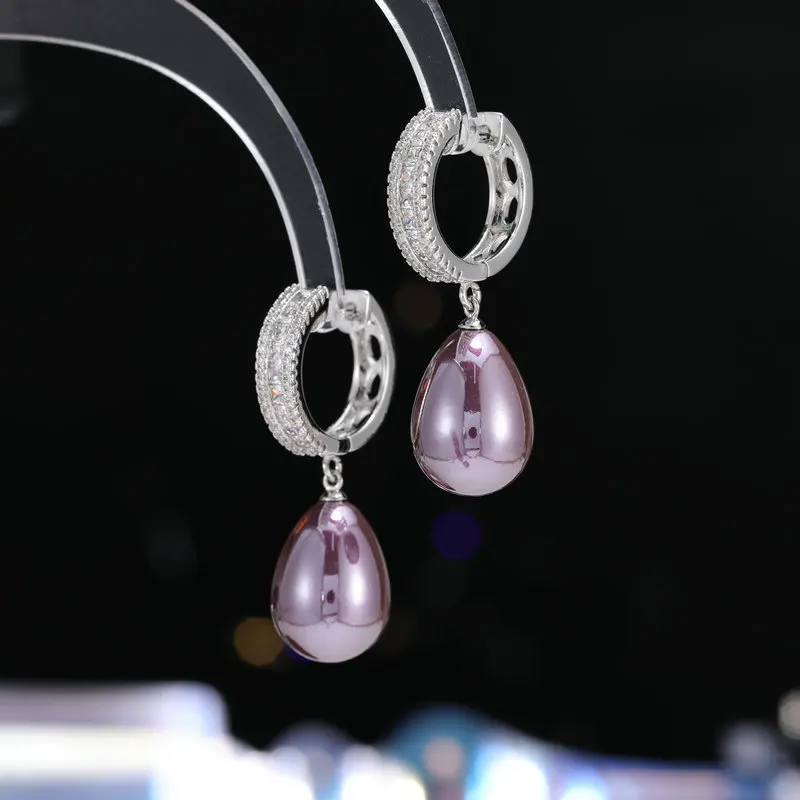 Light Luxury Minimalist High-End Micro Inlaid Zircon Water Drop Pearl Elegant Sweet Versatile Earrings Trendy
Light Luxury Minimalist High-End Micro Inlaid Zircon Water Drop Pearl Elegant Sweet Versatile Earrings Trendy