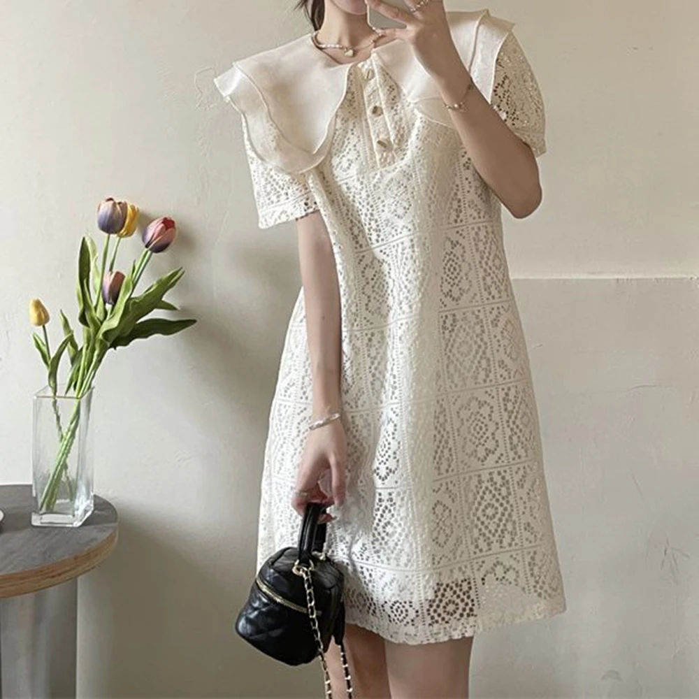 Summer new small cute doll collar lace hollow short-sleeved dress covering meat and showing thin skirt women
Summer new small cute doll collar lace hollow short-sleeved dress covering meat and showing thin skirt women