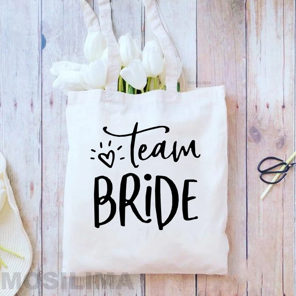 Fashion Shopping Bag Bridal Bachelorette Party Team Bride Wedding Gift Canvas Tote Shoulder Bags Reusable Eco Bag 35*40CM DG071
Fashion Shopping Bag Bridal Bachelorette Party Team Bride Wedding Gift Canvas Tote Shoulder Bags Reusable Eco Bag 35*40CM DG071