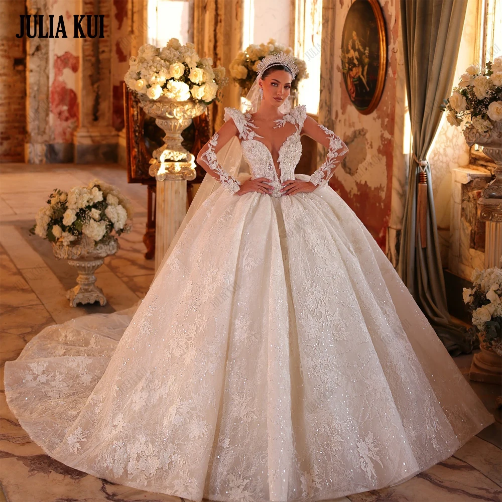 Julia Kui Custom Made Shiny Lace Deep V-Neck Ball Gown Wedding Dresses Full Sleeve Beading Pearls Appliques Princess Bridal Gown
Julia Kui Custom Made Shiny Lace Deep V-Neck Ball Gown Wedding Dresses Full Sleeve Beading Pearls Appliques Princess Bridal Gown