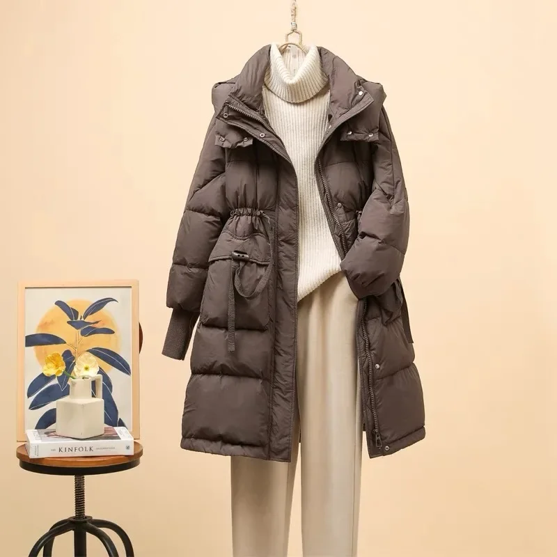 Korean version of hooded drawstring waist thickened down jacket women's medium and long winter new thin fashion small coat
Korean version of hooded drawstring waist thickened down jacket women's medium and long winter new thin fashion small coat