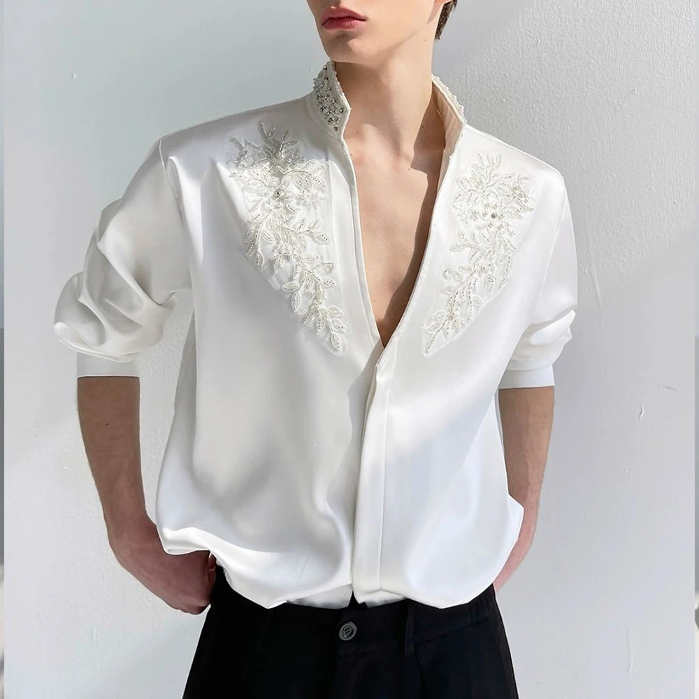Spring And Autumn New Men's Solid Color Pearl Rhinestone Long-Sleeved Shirt Luxury Retro Fashion Trend Slim Sexy Niche Mens Tops
Spring And Autumn New Men's Solid Color Pearl Rhinestone Long-Sleeved Shirt Luxury Retro Fashion Trend Slim Sexy Niche Mens Tops