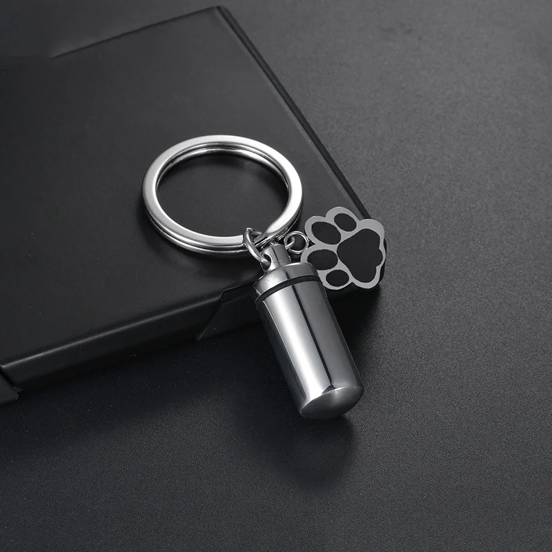 Mini Stainless Steel Pet Urns Paw Pendant Keychain Accessories Cylindrical Paw Print Cat Memorial Dog Ashe for Urns Cremation
Mini Stainless Steel Pet Urns Paw Pendant Keychain Accessories Cylindrical Paw Print Cat Memorial Dog Ashe for Urns Cremation
