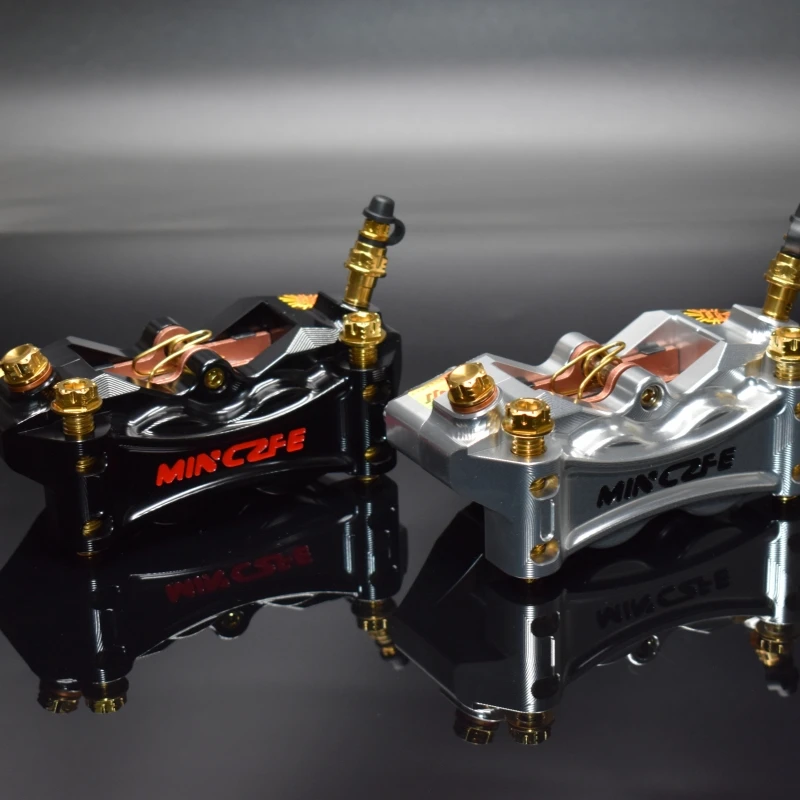 Motorcycle advanced brake caliper 100MM installation spacing opposed four aluminum alloy pistons suitable for front wheels
Motorcycle advanced brake caliper 100MM installation spacing opposed four aluminum alloy pistons suitable for front wheels