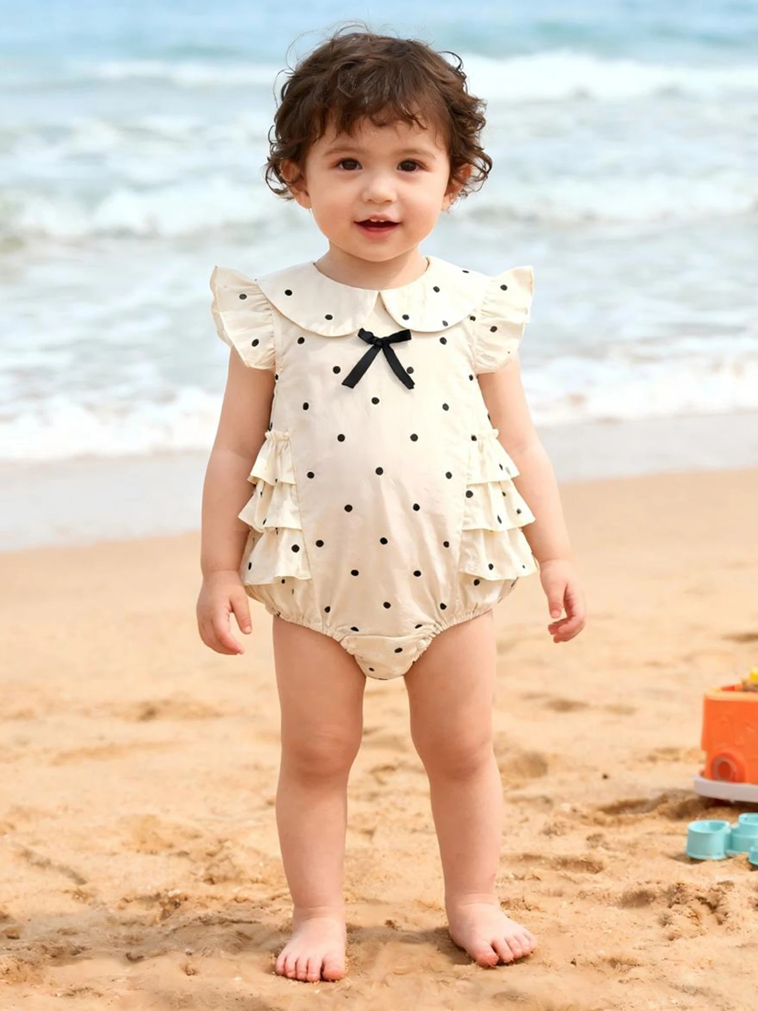 Adorable Infant Girl Polka Dot Romper with Bow Detail and Flutter Sleeves Sweet Doll Collar Jumpsuit for Summer and Spring Wear
Adorable Infant Girl Polka Dot Romper with Bow Detail and Flutter Sleeves Sweet Doll Collar Jumpsuit for Summer and Spring Wear