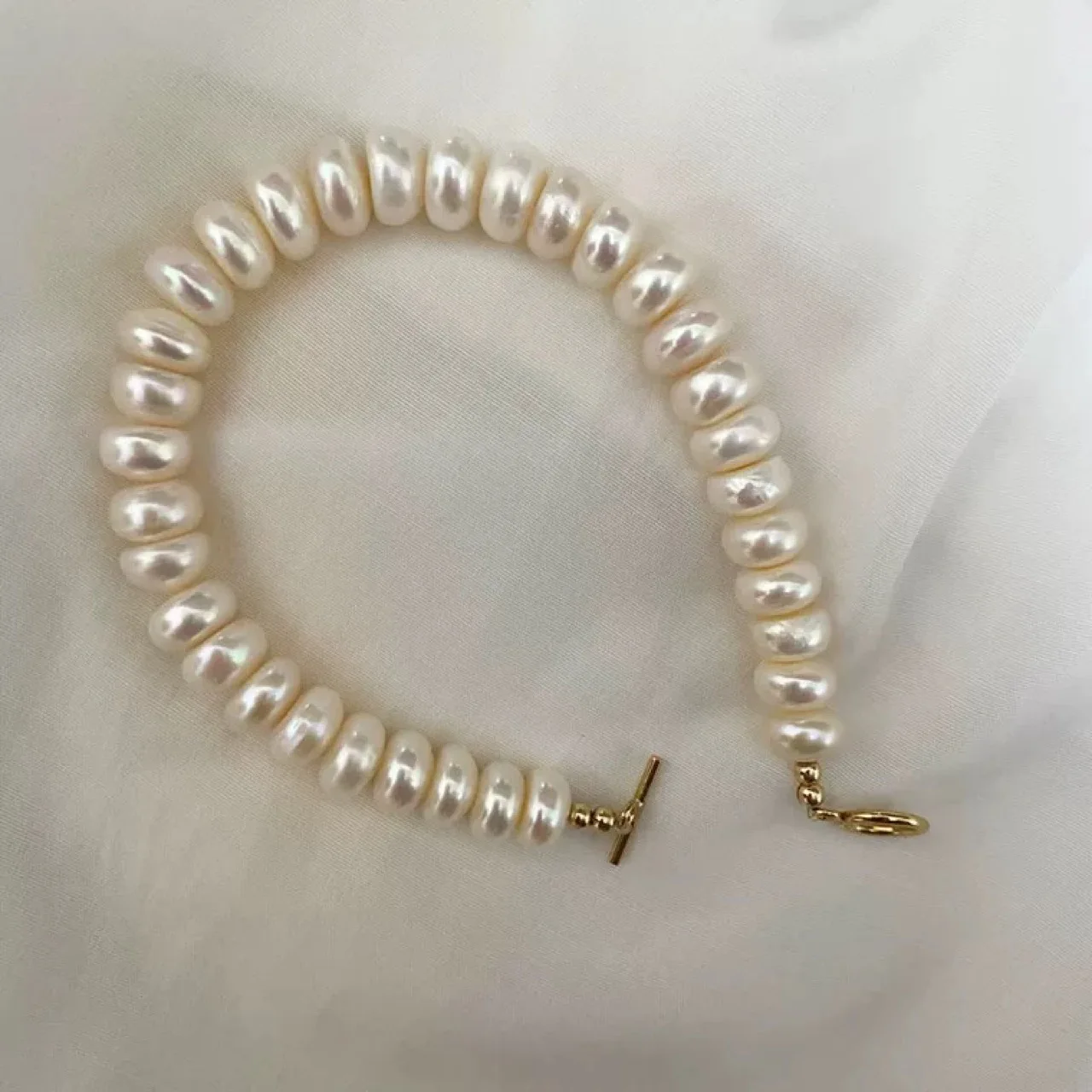 Hengsheng 6-7mm Bread Round Freshwater Pearl Bracelet for Women 17.5cm Length Gold color OT Buckle Bracelet Jewelry Gift
Hengsheng 6-7mm Bread Round Freshwater Pearl Bracelet for Women 17.5cm Length Gold color OT Buckle Bracelet Jewelry Gift