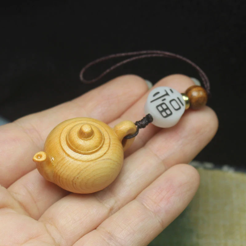 Cypress wood teapot pendant, wooden craft for men and women, phone chain, bag accessory, simple gift
Cypress wood teapot pendant, wooden craft for men and women, phone chain, bag accessory, simple gift