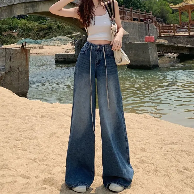 Drawstring slim-fit high-waisted jeans for women2025Vintage blue loose wide-leg pants with a draping, floor-length design
Drawstring slim-fit high-waisted jeans for women2025Vintage blue loose wide-leg pants with a draping, floor-length design