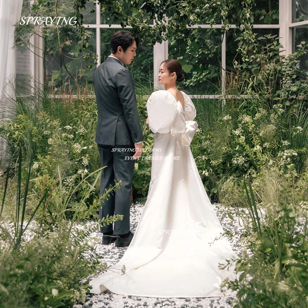 SPRAYING Simple Square Neck Wedding Dress Korea Photoshoot A Line Bow Bridal Gown Taffeta Puffy Sleeve Bridal Dresses
SPRAYING Simple Square Neck Wedding Dress Korea Photoshoot A Line Bow Bridal Gown Taffeta Puffy Sleeve Bridal Dresses