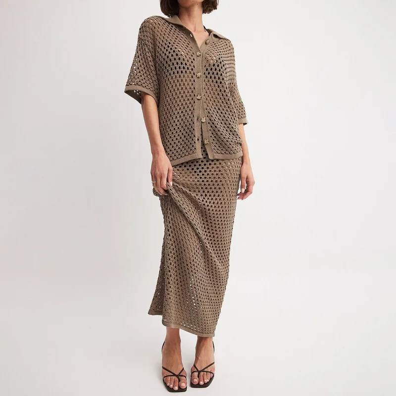 European Spring Summer Short Sleeve Lapel Button Top Solid Color Fashion Hollow Knitted Long Skirt Women Suit
European Spring Summer Short Sleeve Lapel Button Top Solid Color Fashion Hollow Knitted Long Skirt Women Suit