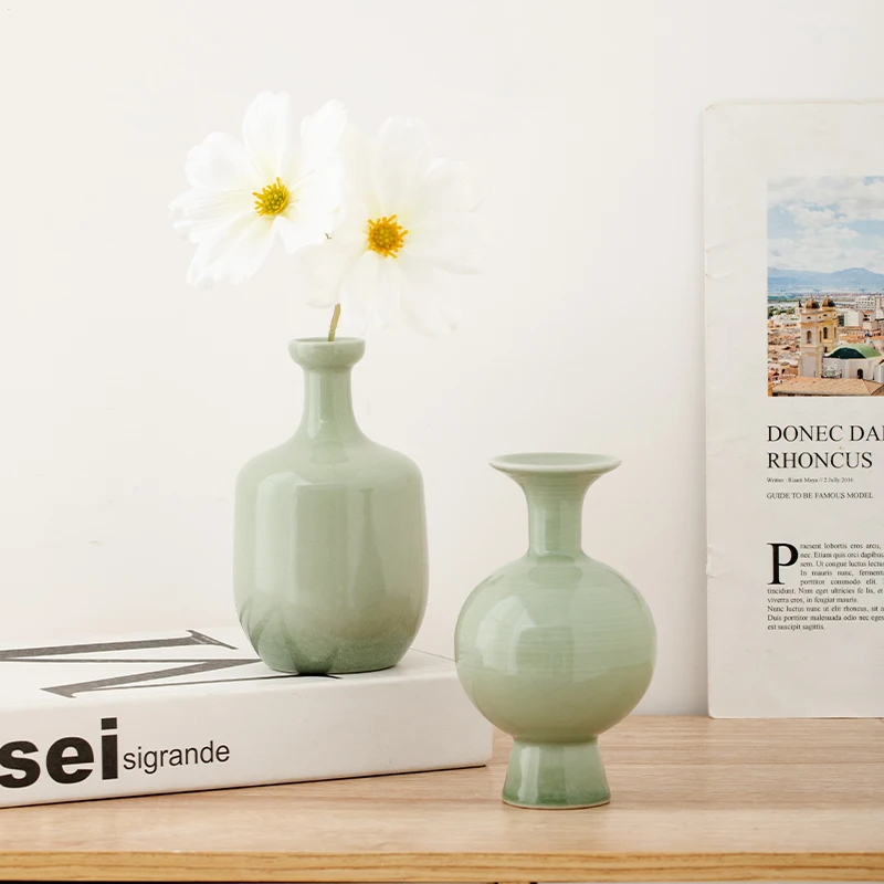 Ceramic vase with simple and creative design, small diameter, green flower arrangement water culture flower display piece
Ceramic vase with simple and creative design, small diameter, green flower arrangement water culture flower display piece