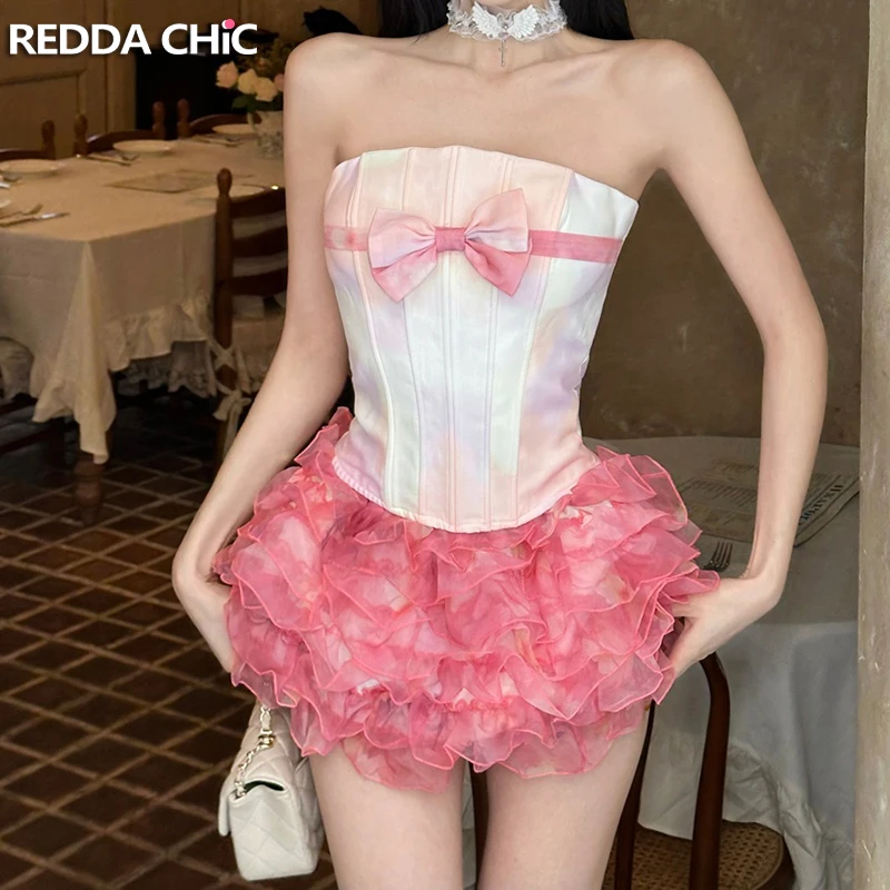 Комплект ReddaChic: топ-бандо с лентами и пышная многоярусная мини-юбка с рюшами, корсет с бантом и эластичной талией, женская летняя одежда в стиле Cutecore
Комплект ReddaChic: топ-бандо с лентами и пышная многоярусная мини-юбка с рюшами, корсет с бантом и эластичной талией, женская летняя одежда в стиле Cutecore