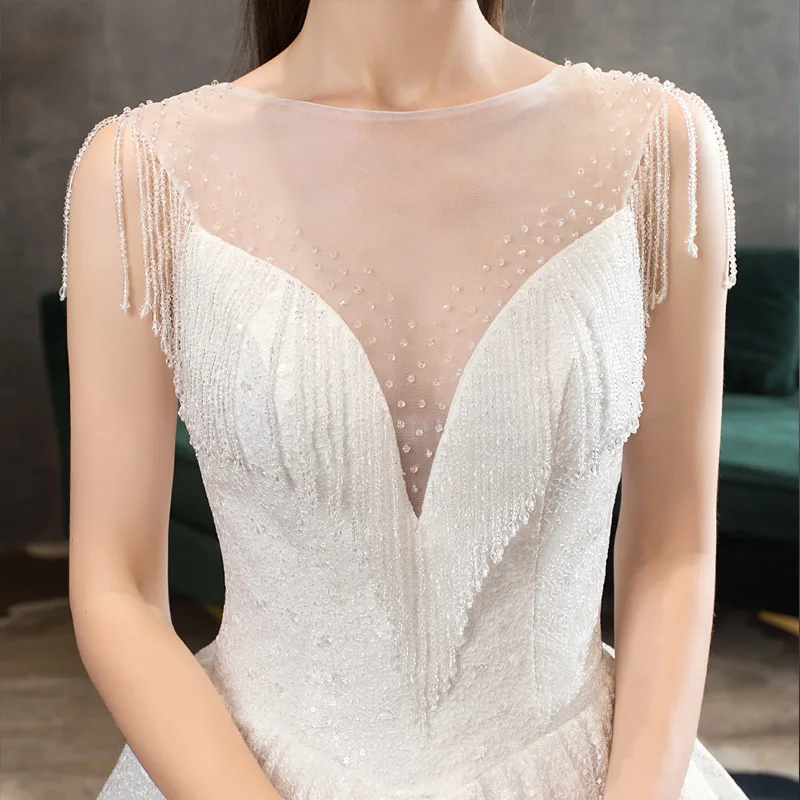 Customized Beading O Neck Pretty Lace Tassel Wedding Dress 2025 New Sweet Ball Gown Plus Size Elegant Wedding Dresses For Women
Customized Beading O Neck Pretty Lace Tassel Wedding Dress 2025 New Sweet Ball Gown Plus Size Elegant Wedding Dresses For Women