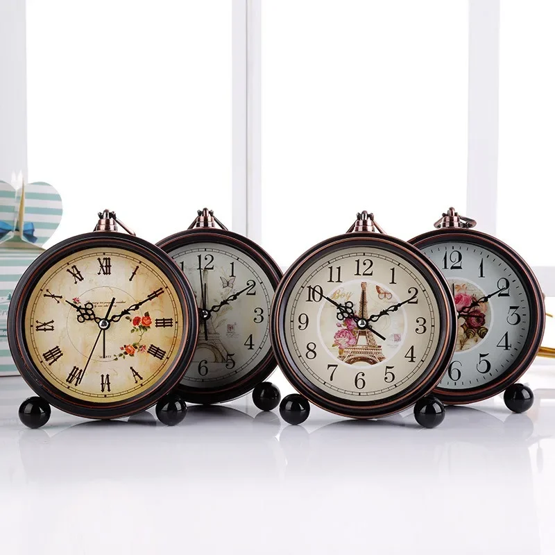 European Retro Metal Quartz Alarm Clock Creative Architecture Pastoral Style Decorative Table Clock Room Ornaments Wake-up Watch
European Retro Metal Quartz Alarm Clock Creative Architecture Pastoral Style Decorative Table Clock Room Ornaments Wake-up Watch