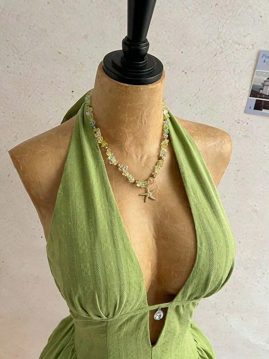 Green Halter Neck Boho Mini Dress With Knot Back And High Waist
Green Halter Neck Boho Mini Dress With Knot Back And High Waist