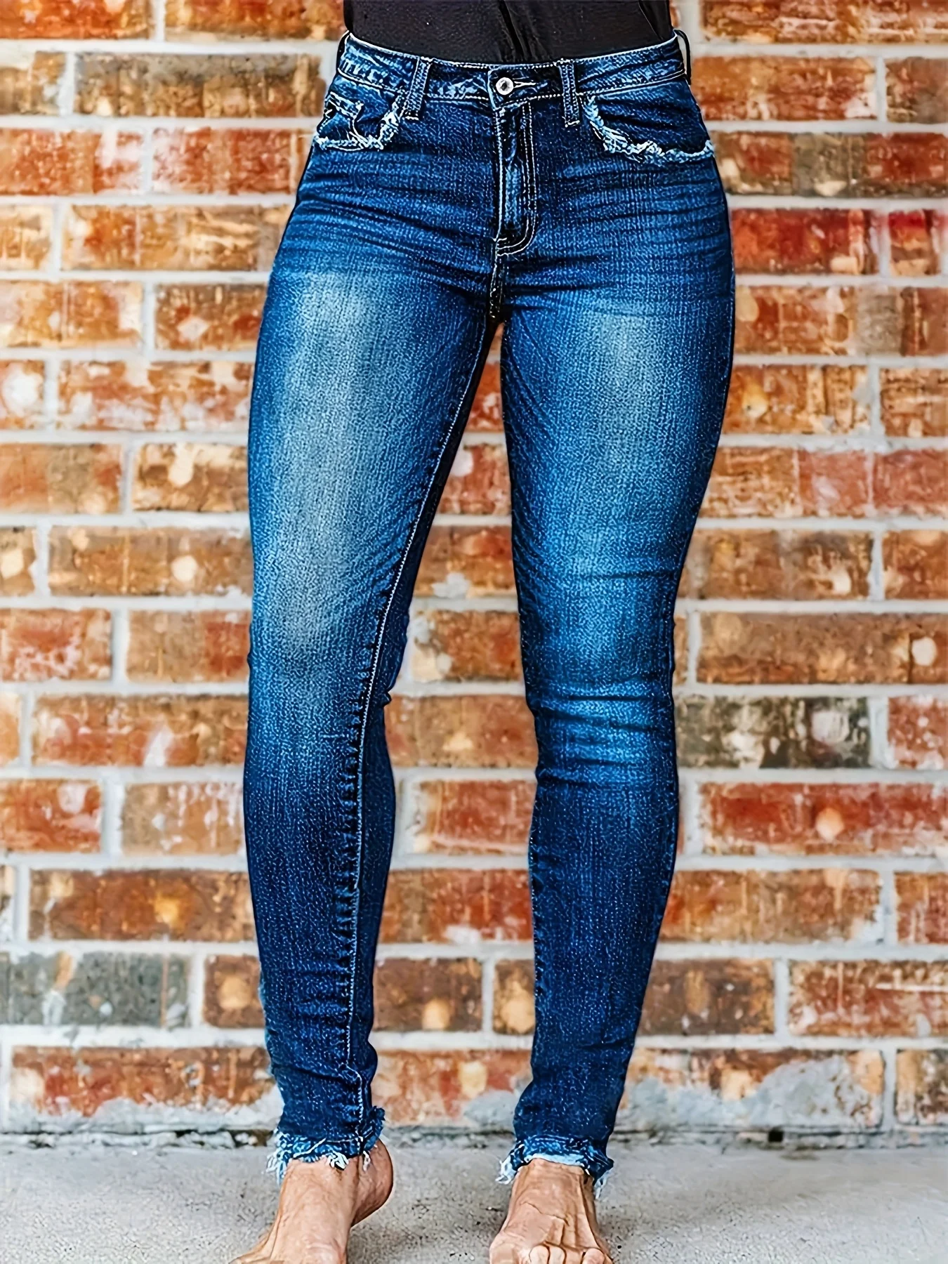Women's blue elastic denim leggings with a fuzzy edge that slims the figure
Women's blue elastic denim leggings with a fuzzy edge that slims the figure