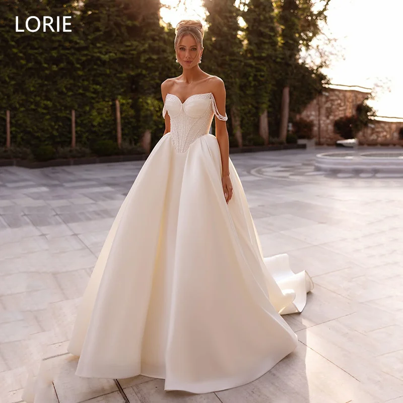 LORIE Satin Shiny A-line Beeding Applique Wedding Dress Off Shoulder Bridal Gowns Backless Wedding Gown Customized 2025
LORIE Satin Shiny A-line Beeding Applique Wedding Dress Off Shoulder Bridal Gowns Backless Wedding Gown Customized 2025