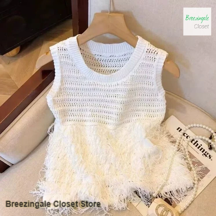 Korean tassel hollow knit camisole women's spring and summer new fashion high-quality temperament slim sleeveless casual top
Korean tassel hollow knit camisole women's spring and summer new fashion high-quality temperament slim sleeveless casual top